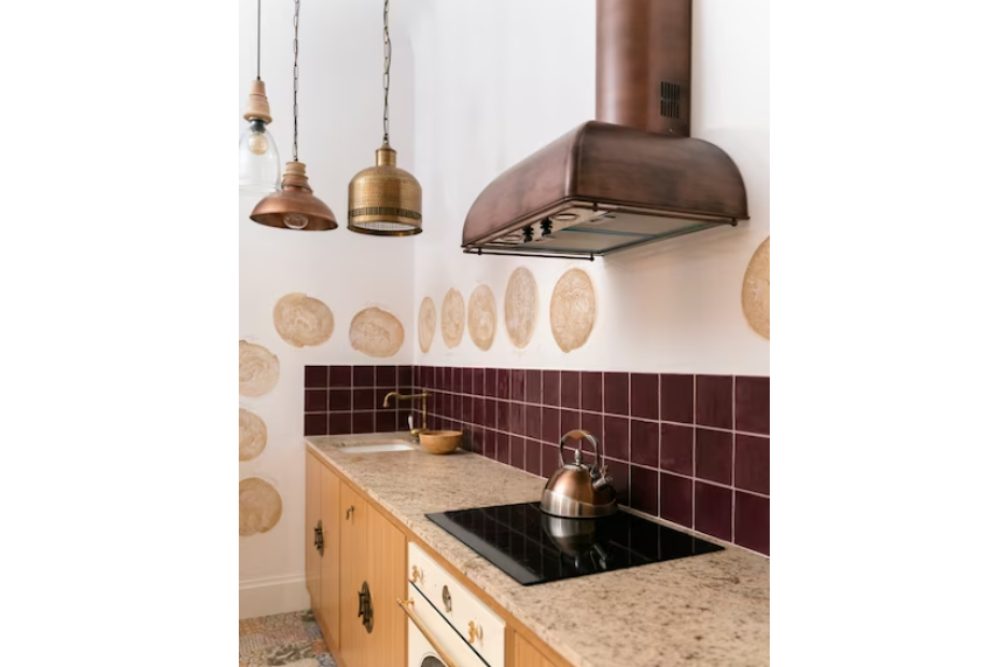 Copper and Brass Accented Modular Kitchen